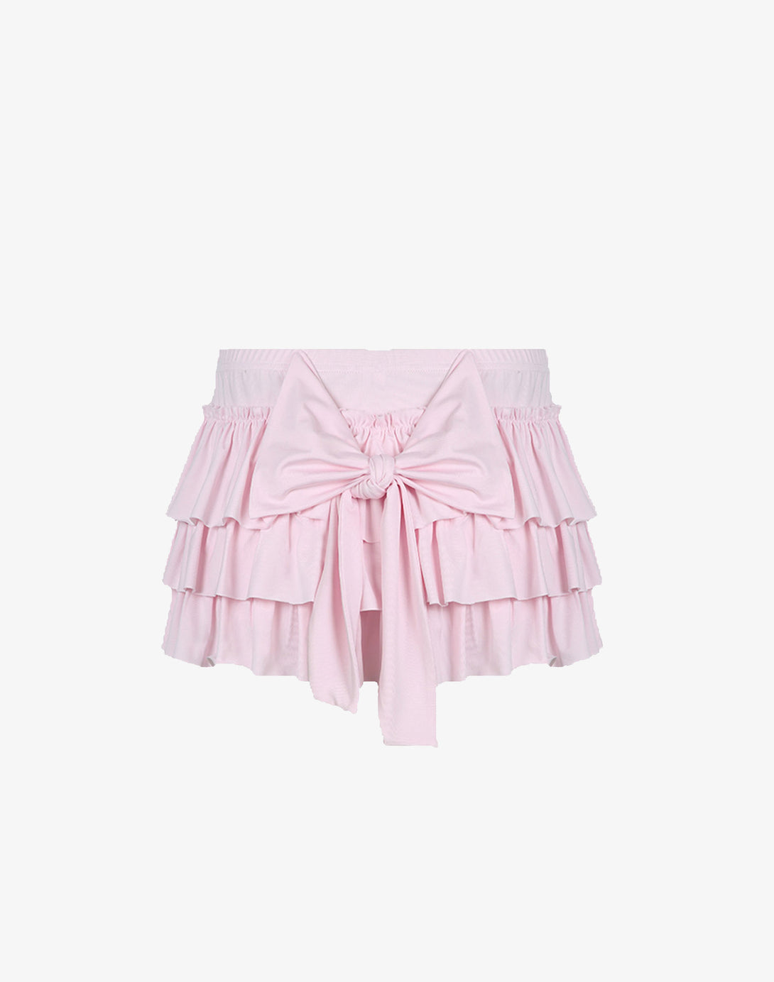 A flat lay of the dollette aesthetic mini skirt in soft pink.