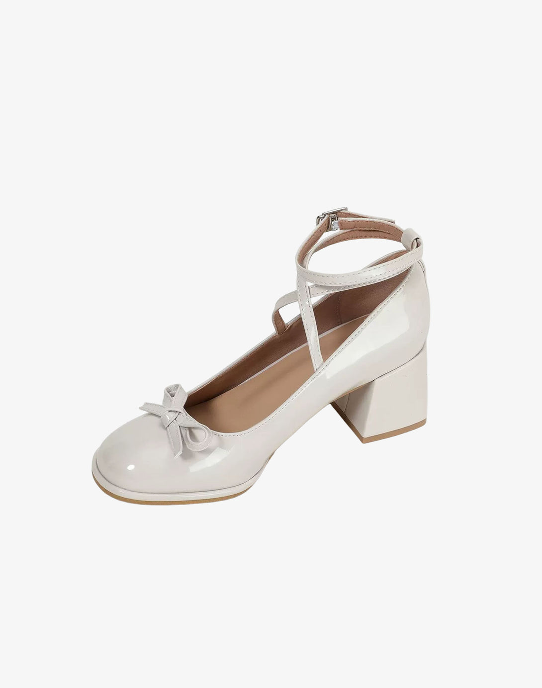 ivory patent dollette heel with rounded toe, wrap ankle straps, and bow accent