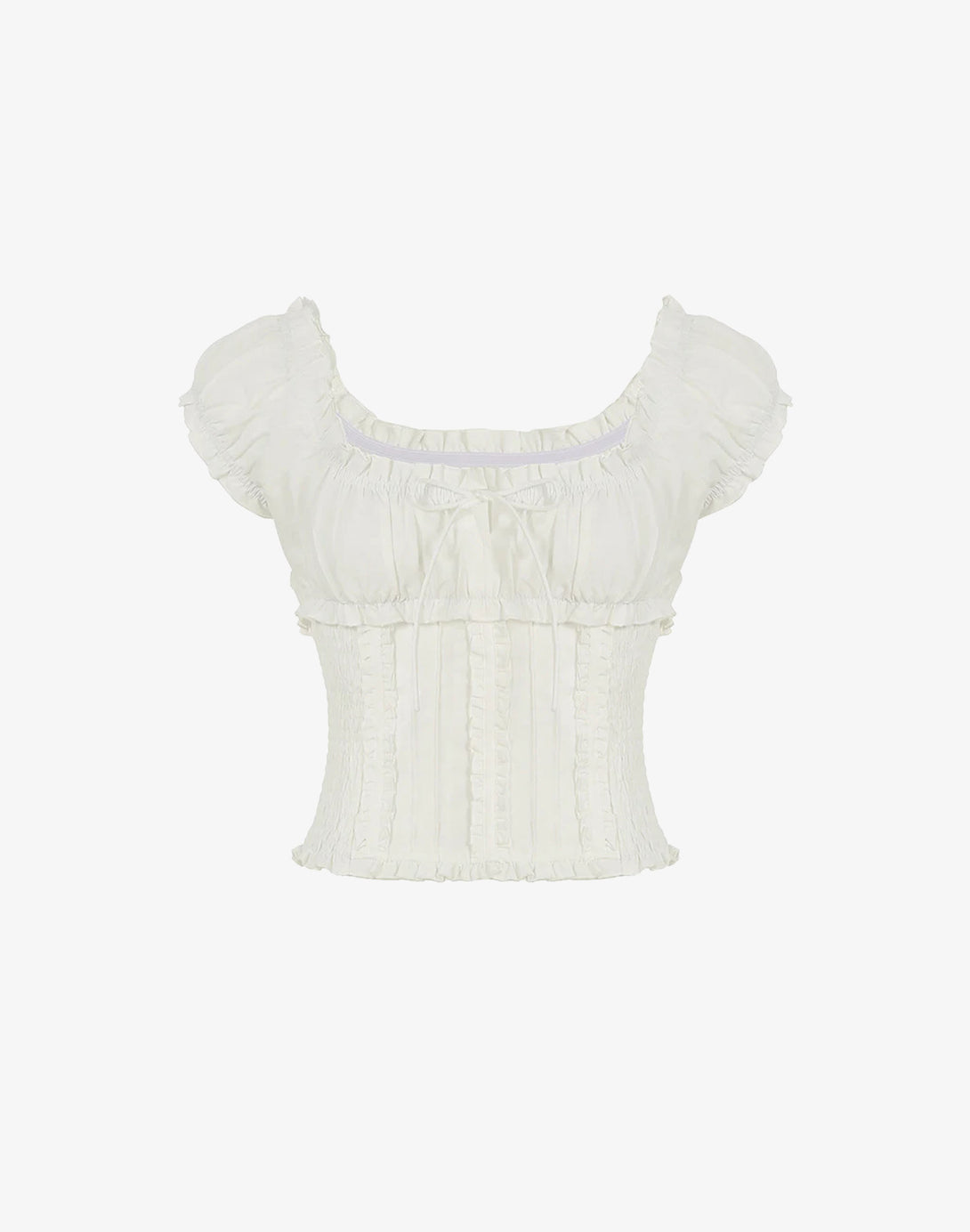 White coquette-style ruched top with puff sleeves, bow detail, and smocked body displayed on plain background.





