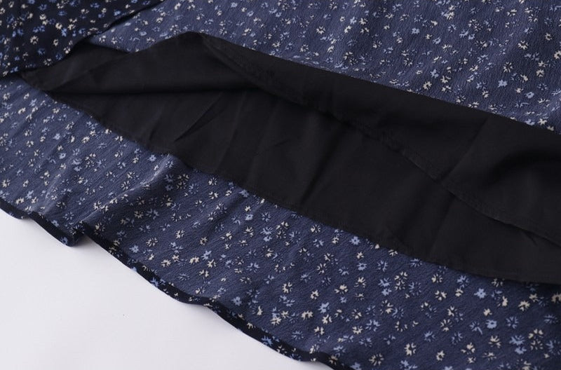black lining inside navy floral fishtail skirt for added comfort and opacity
