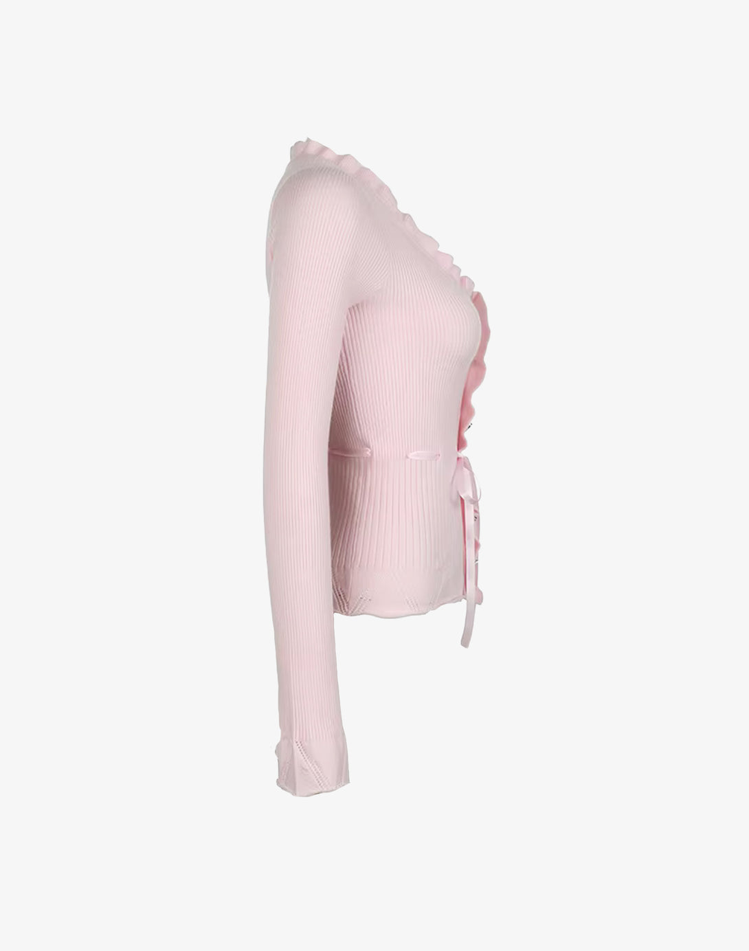Side view of the pink cardigan, highlighting the ribbed texture, long sleeves with ruffled cuffs, and the dollette outfit vibe.