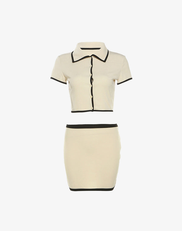 cream cropped collared top and mini skirt set with black trim styled in feminine elegant and soft girl fashion