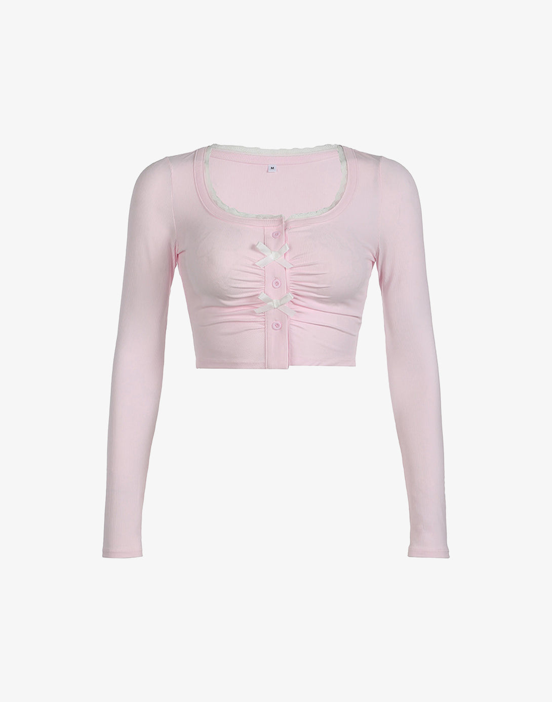 Front view of a pink ruched bow button crop top, ideal for Kawaii style and hyper feminine fashion lovers.