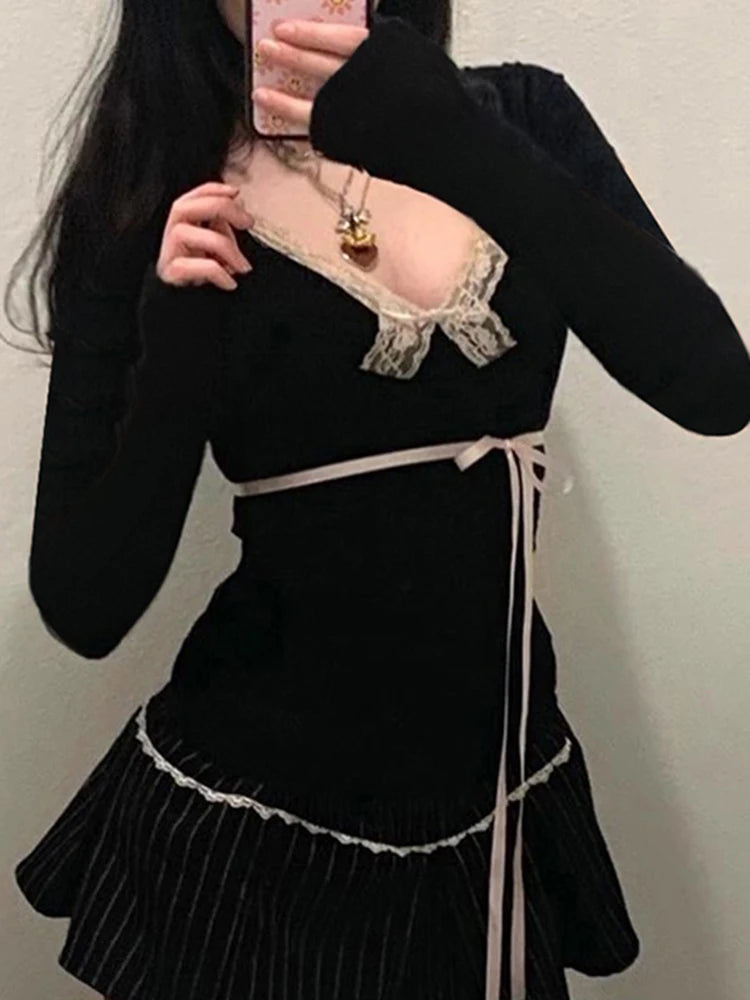 Angled view of the top on a model, highlighting the pink ribbon tied at the waist for a hyper feminine fashion look.