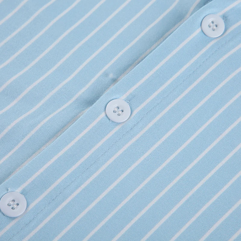 vertical stripe detail and buttons on ruched front blouse for casual formal fashion
