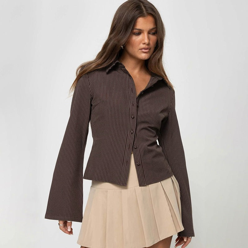 A stylish look featuring the ladies fitted long sleeve blouse, showcasing its 70s style.