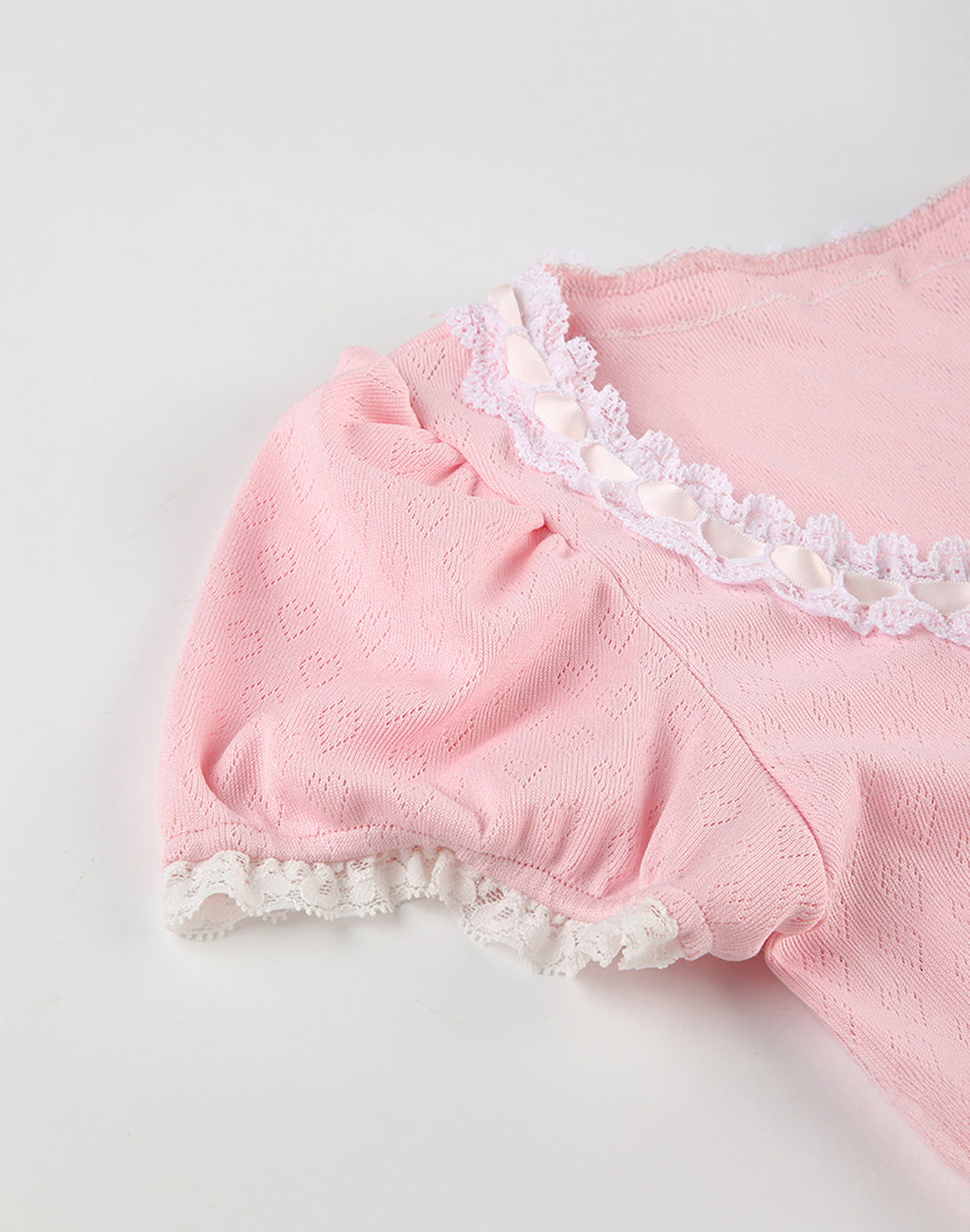 Detailed view of the lace trim and ruched front of the Sweetheart Kawaii Lace Trim Top, focusing on the soft, feminine design.