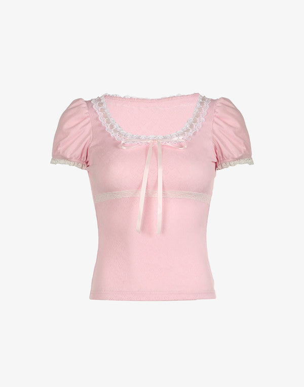 Front view of the Sweetheart Kawaii Lace Trim Top in soft pink, featuring a rounded neckline, lace trim, and a front tie ribbon for a cute feminine look.