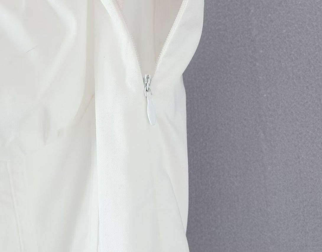 closeup of hidden side zipper on formal coquette party dress