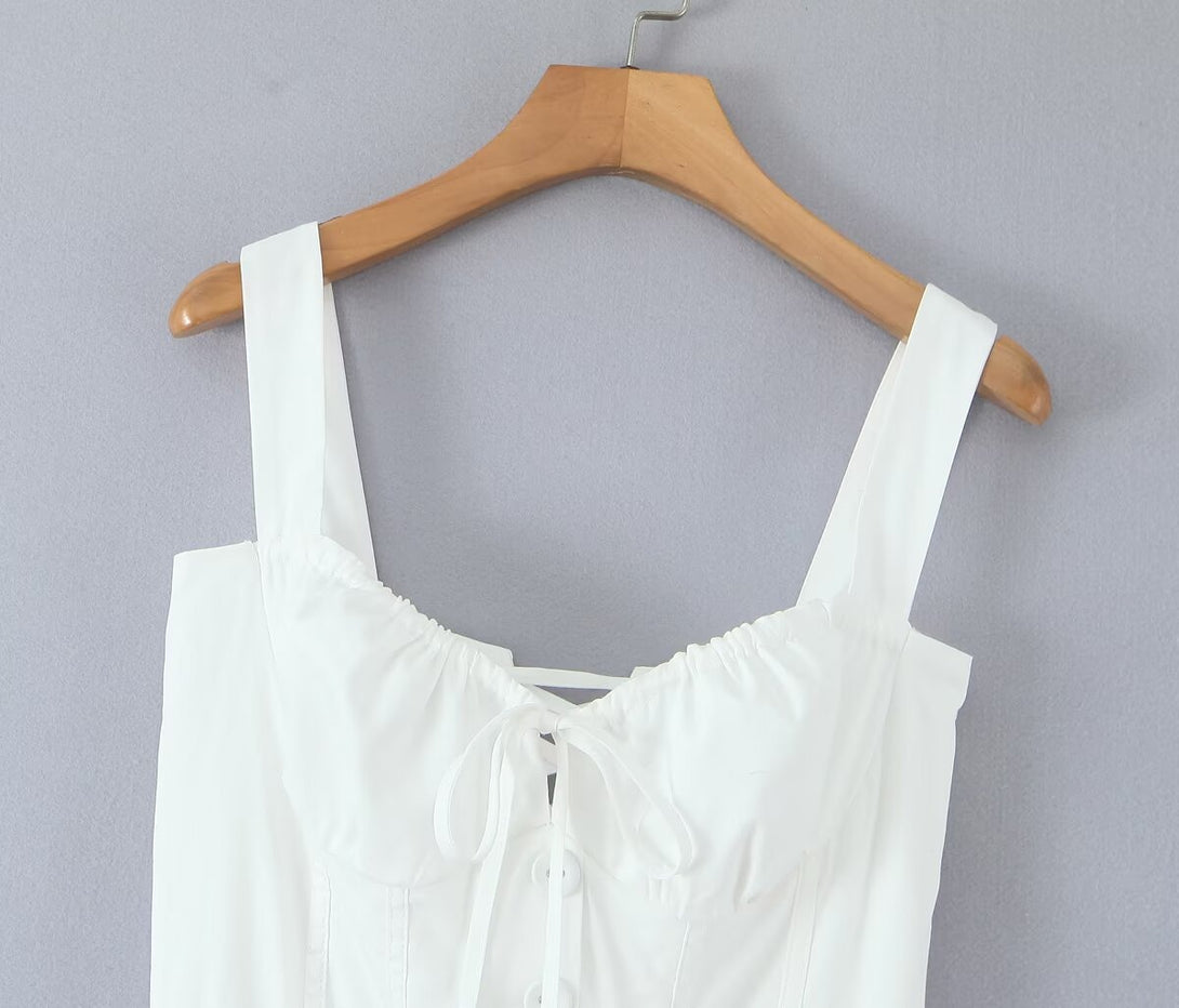 white corset midi dress with lace waist inset and button-down front