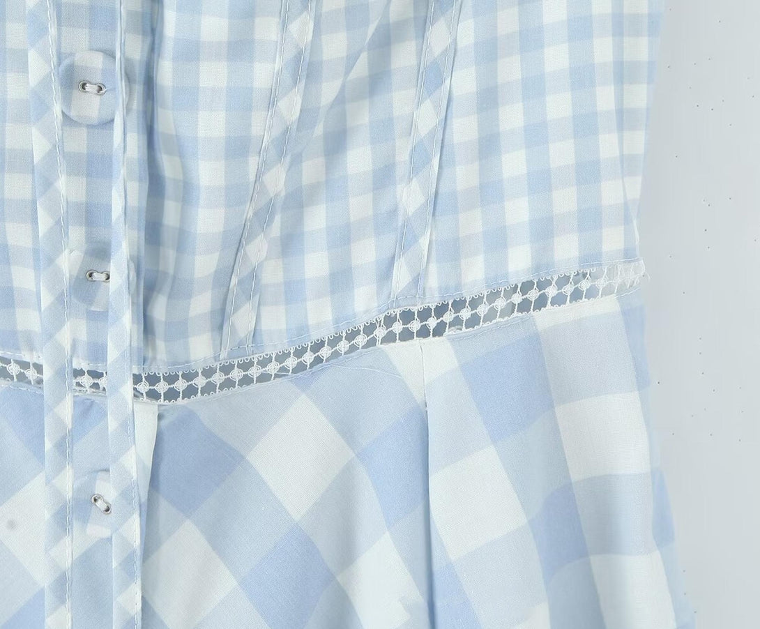 close-up of lace waist trim and gingham bodice with buttons and bust seams
