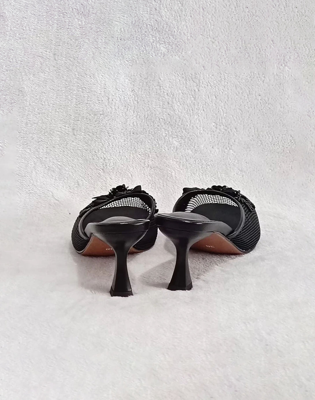 black breathable mesh mules with sparkle appliqué and comfortable kitten heel design