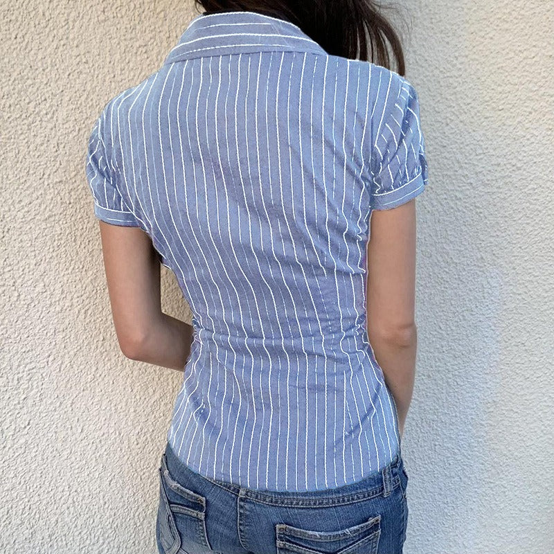 Back view of the ladies fitted pinstripe blouse, showing its clean and professional silhouette.