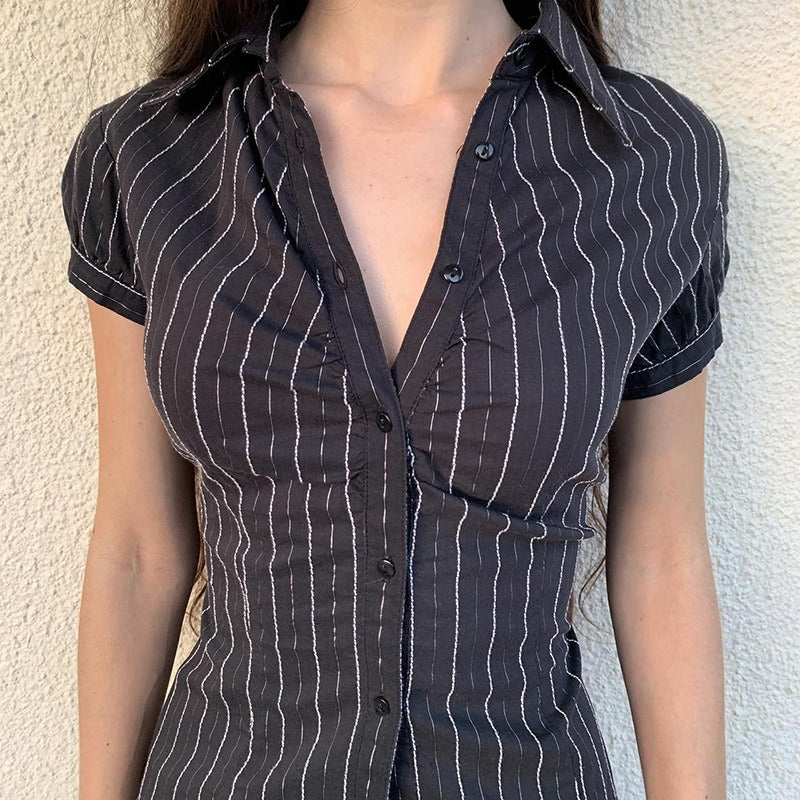 Angled front view showcasing the flattering, ladies fitted silhouette of the stretch pinstripe blouse.
