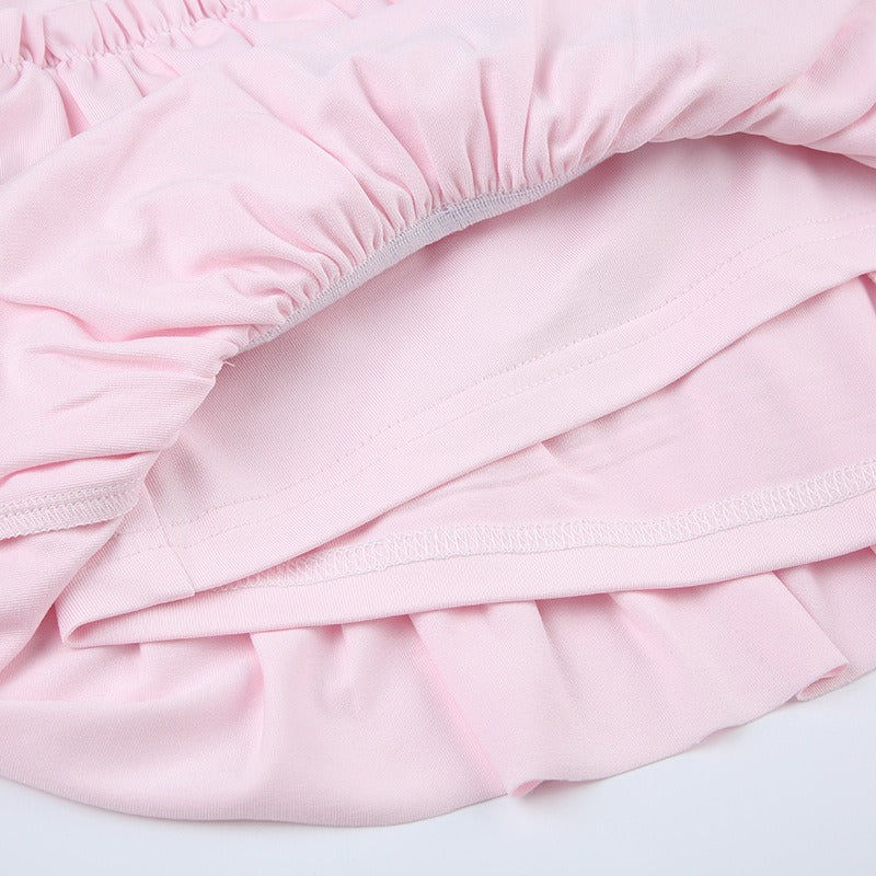 An interior view showing the lining and construction of the pink ruffle skirt.