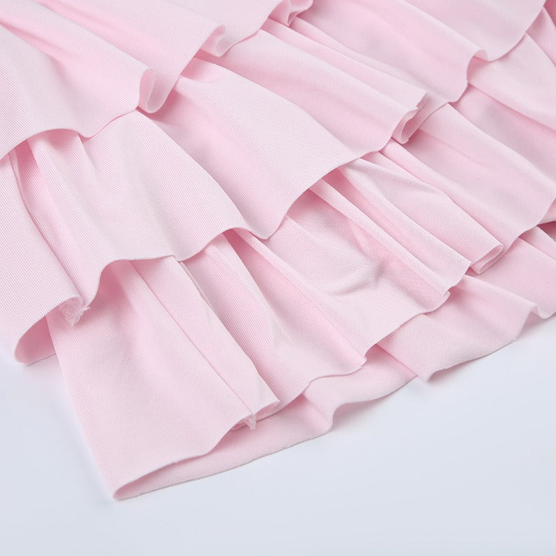 A detailed shot of the cascading layers on the tiered ruffle mini skirt.